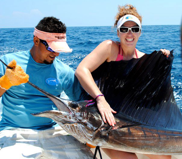 Leigh Ann and a sail fish in Costa Rica